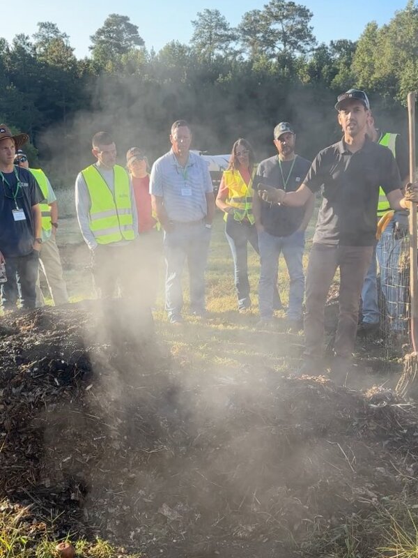 Jorge Montezuma teaching at a composting site